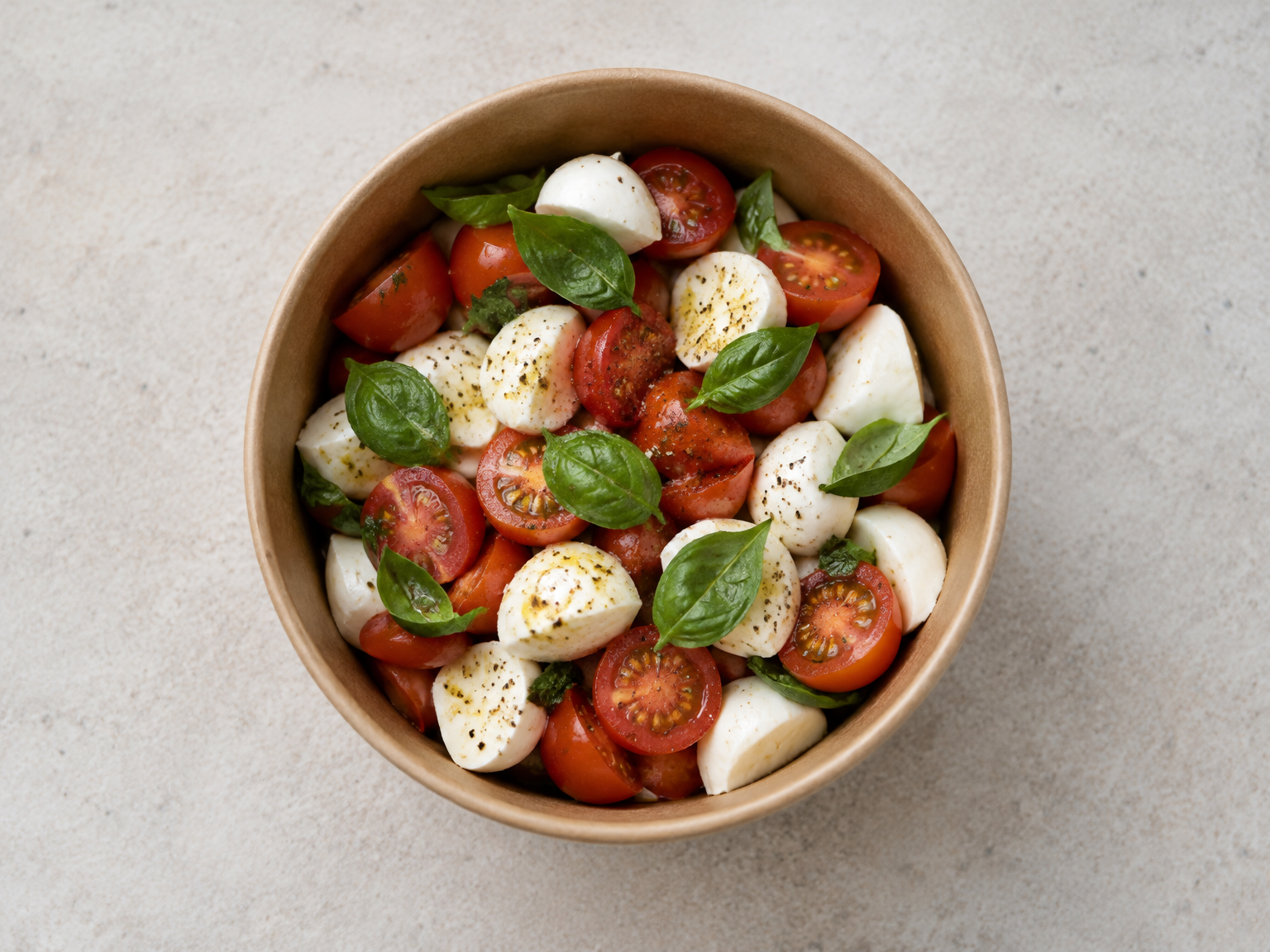 Tomato, mozzarella and basil takeaway salad generated with the Umami Create framework